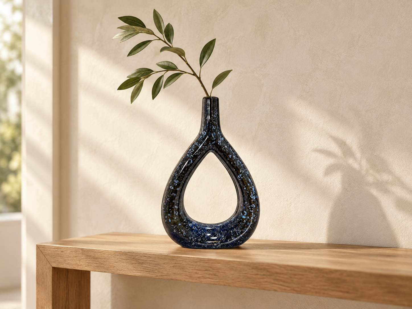 AABHA blue multicolour loop vase styled on a console