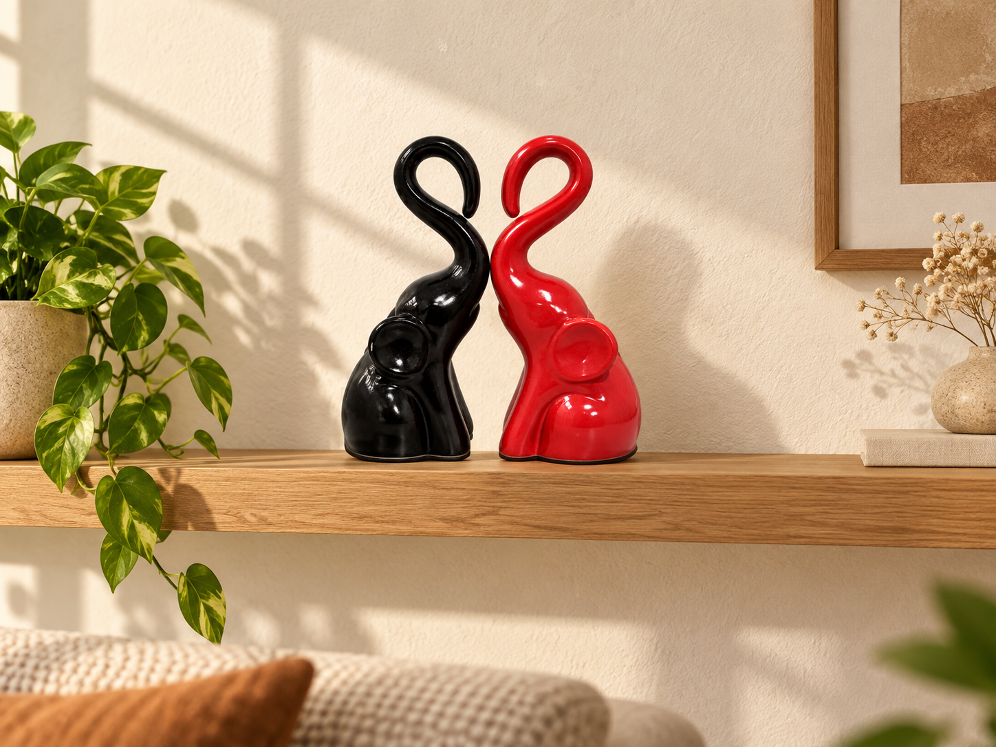AAROH red and black elephant duo styled on a shelf